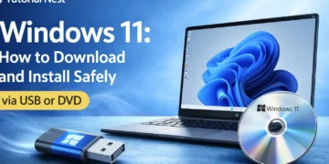 Realistic banner showing Windows 11 installation guide with a laptop, USB drive, and DVD, featuring Tutorial Nest logo.