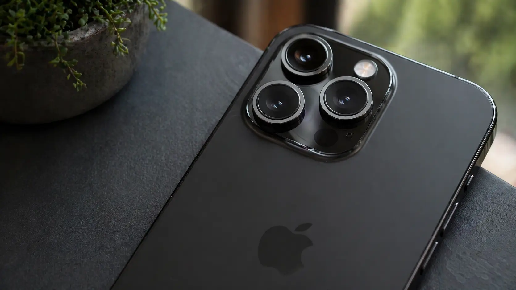 modern smartphone with advanced camera system placed on a surface showing premium mobile photography design