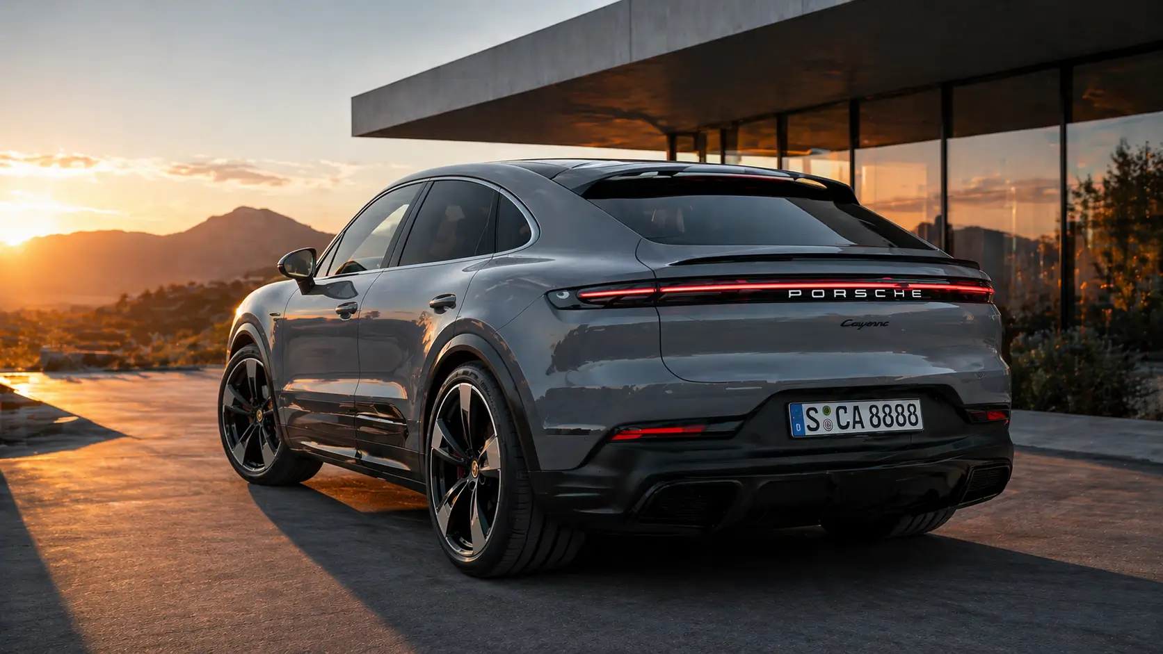 Porsche Electric Cayenne Coupe parked outside a modern luxury home